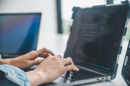 Female programmer working on coding, software development and web design.Concept technology...