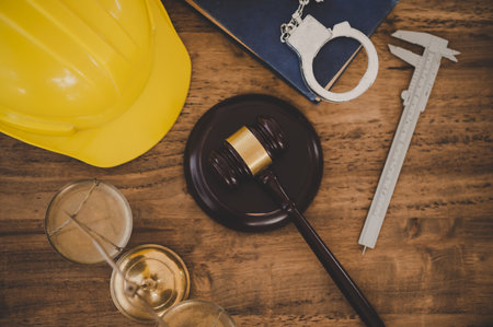 Judge's hammer and helmet Law and Justice about labor law concept Construction law.