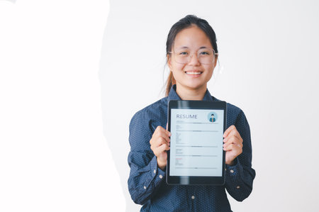 Asian young holding resume applying to apply for a job