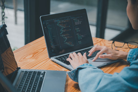 Female programmer working on coding, software development and web design.Concept technology...