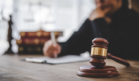 Law theme, mallet of the judge, law enforcement officers, evidence-based cases and documents taken...