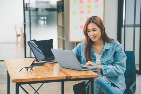 Female programmer working on coding, software development and web design.Concept technology development.の写真素材