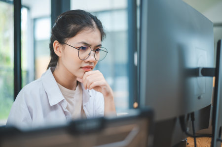 Female programmer working on coding, software development and web design.Concept technology development.の写真素材
