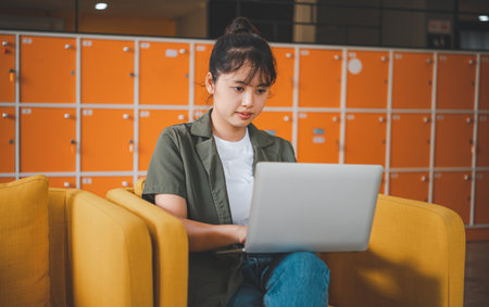 Teenage Asian  are communicating through video conferencing for online learning. In a video conference call via apps. new normal conceptの写真素材