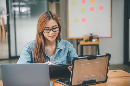 Female programmer working on coding, software development and web design.Concept technology development.の写真素材