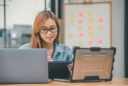 Female programmer working on coding, software development and web design.Concept technology development.の写真素材