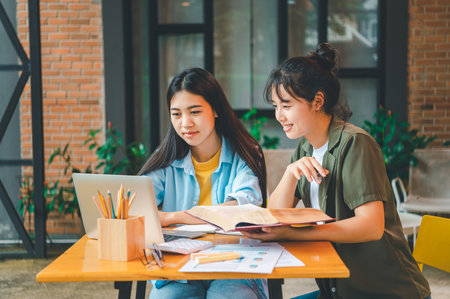 group of business people working and communicating together in the office With the charging of graphs for analysis, conceptual analysis and business planningの写真素材
