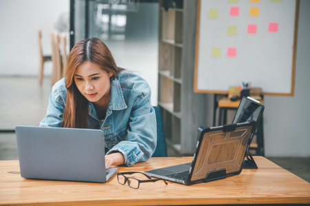 Female programmer working on coding, software development and web design.Concept technology development.の写真素材