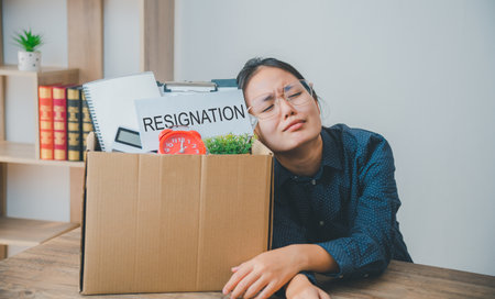 Female company employee stressed and fed up after quitting her job to look for a new job, fired or...