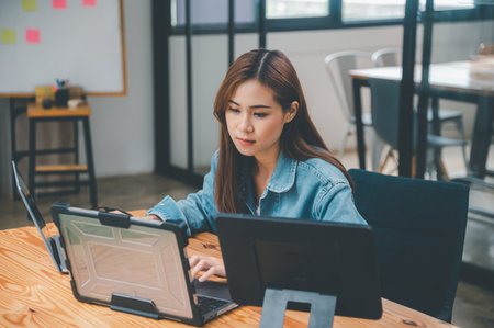 Female programmers are thinking and planning to work on programming, software coding and web design.Concept technology development.の写真素材