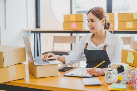 Small business owners online are taking orders and products that their customers have ordered. and...