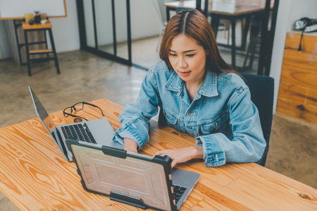 Female programmer working on coding, software development and web design.Concept technology development.の写真素材