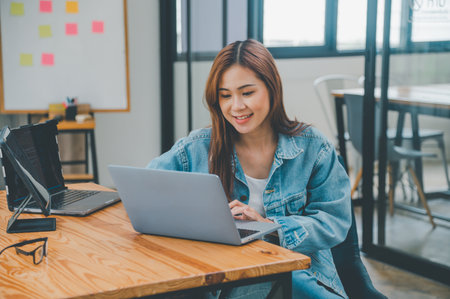 Female programmer working on coding, software development and web design.Concept technology development.の写真素材