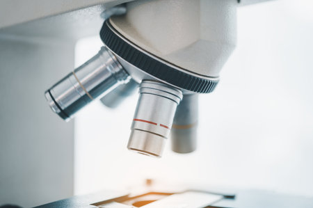 Researchers are experimenting with pipette dropping a sample into a test tube in an experiment in...