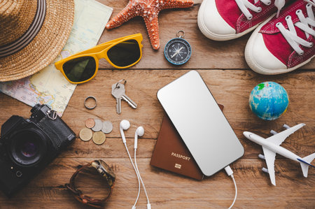 Travel accessories. The cost of travel maps prepared for the trip. Travel planning concept