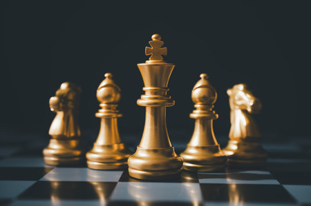 The set of golden chess pieces element is on the chalkboard.chess board game concept of business...