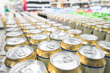 Aisles of shelves with goods in supermarketの写真素材