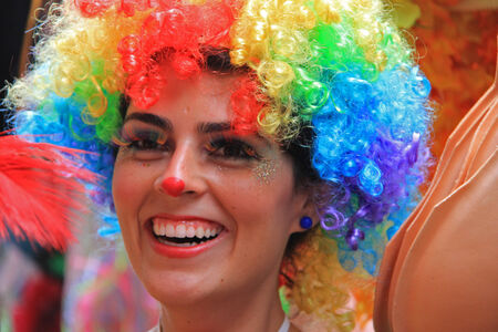 A young smiling lady wearing a wig at a street party in Rio, Brazil 01 Mar 2014 No model release available Editorial use onlyのeditorial素材