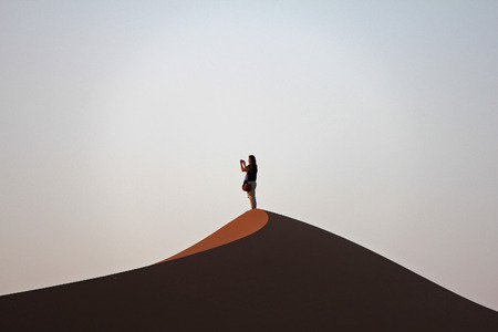 A women on a sand dune in Morocco 19 Jul 2013 No model release Editorial use onlyのeditorial素材