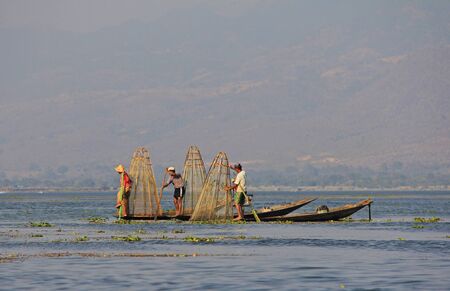 Men fishing on Inle Lake in Myanmar Feb 2015 No model release Editorial use onlyのeditorial素材