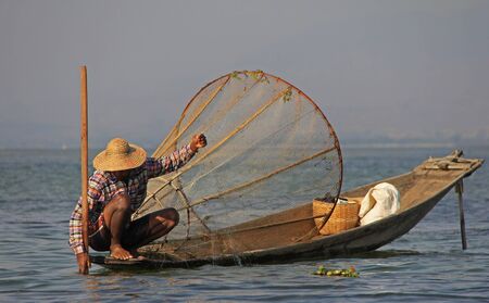 A man fishing on Inle Lake in Myanmar Feb 2015 No model release Editorial use onlyのeditorial素材
