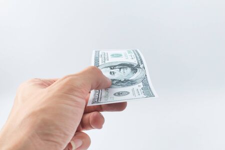 Hand pay money bank note, United States dollar USDの写真素材
