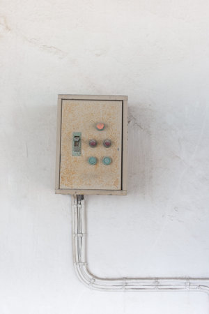 old vintage grungy light switch in warehouse