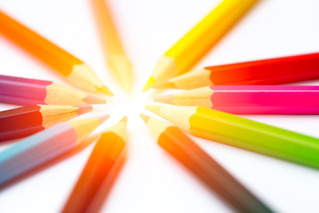 colors pencil head direction together with light, creative teamwork concept.の写真素材