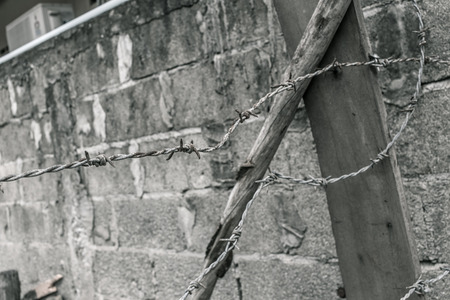 barbed wire fence with vintage color toneの写真素材