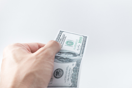 Hand pay money bank note, United States dollar (USD)の写真素材