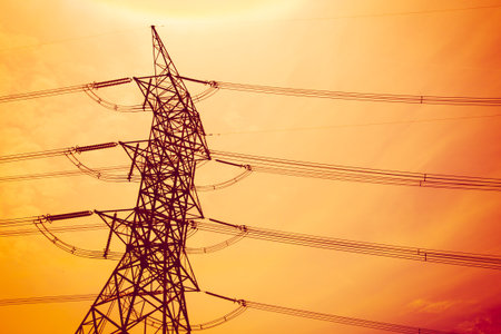 Electricity post on sunset sky