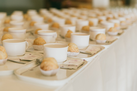 coffee brake, row of prepare coffee set with cookie in the hotel seminar.の写真素材
