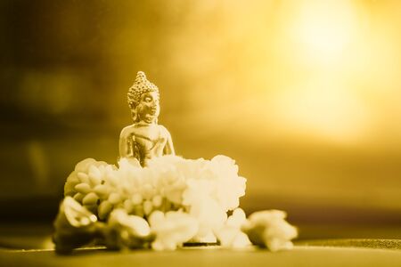 small golden Buddha with space for textの写真素材