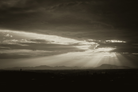 sun light ray in the mountain vintage color tone.の写真素材