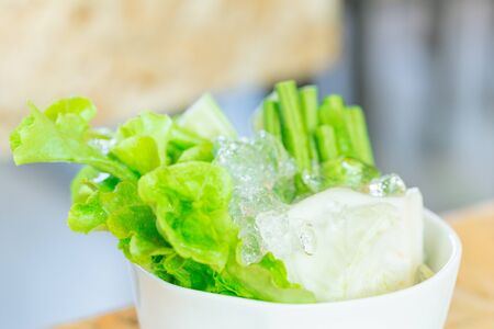 eating fresh cool vegetable with dinner food as side dish, healthy lifestyle of Asian people.の写真素材