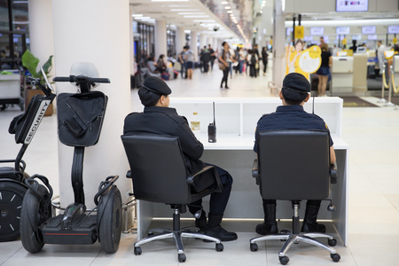 BANGKOK,THAILAND-February 16,2017: Airport Police on duty using Segway to patrol and security around the Terminal for prevent terrorist.のeditorial素材