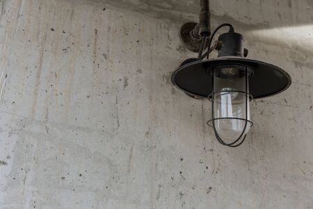industrial street light decoration. white wall lighting vintage retro style in black and white with space for text.の写真素材