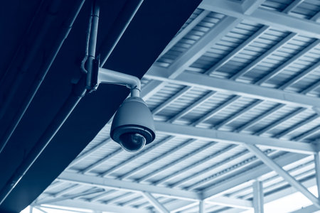 CCTV security camera in ceiling roof building dome outdoor cam.