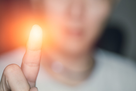 hand finger touch, power of finger print technology concept.の写真素材