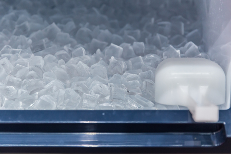 clean cool ice block from ice making machine for cooling fresh drinking in hot summer season.の写真素材