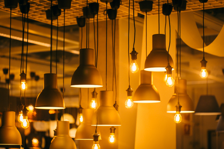 Retro industrial loft style hanging tungsten lamp bulb decoration old vintage modern home.の写真素材