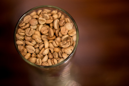 Unroasted coffee beans or White Green coffee bean beautiful decoration.の写真素材