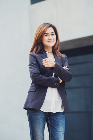 Good job concept of Asian business women thumb up.の写真素材