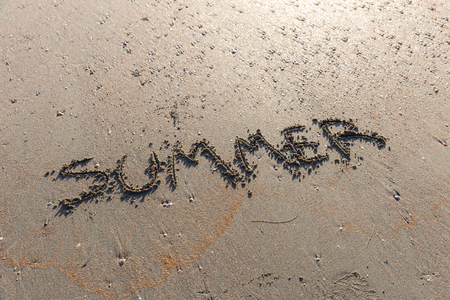 summer text word on the sand sea beachの写真素材