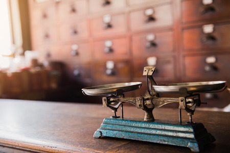 herbal scales herb sell old weight balance in Thai Indian Chinese herbs shopの写真素材