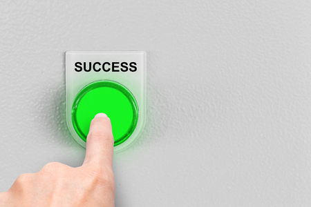 man finger press business success button conceptの写真素材
