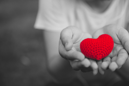 Love and Hearts giving love and care together in valentine's day conceptの写真素材