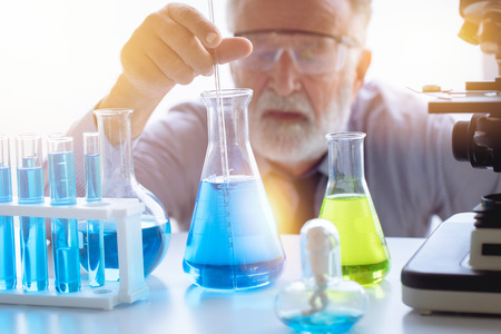 Chemistry professor scientist in science chemical lab to testing new medical formularの写真素材