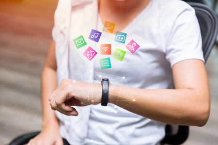 Woman using Smartwatch in fitness with flat app icon illustration conceptの写真素材