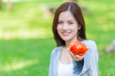 Tomato high antioxidant lycopene vitamin C for girl teen healthy skin.の写真素材